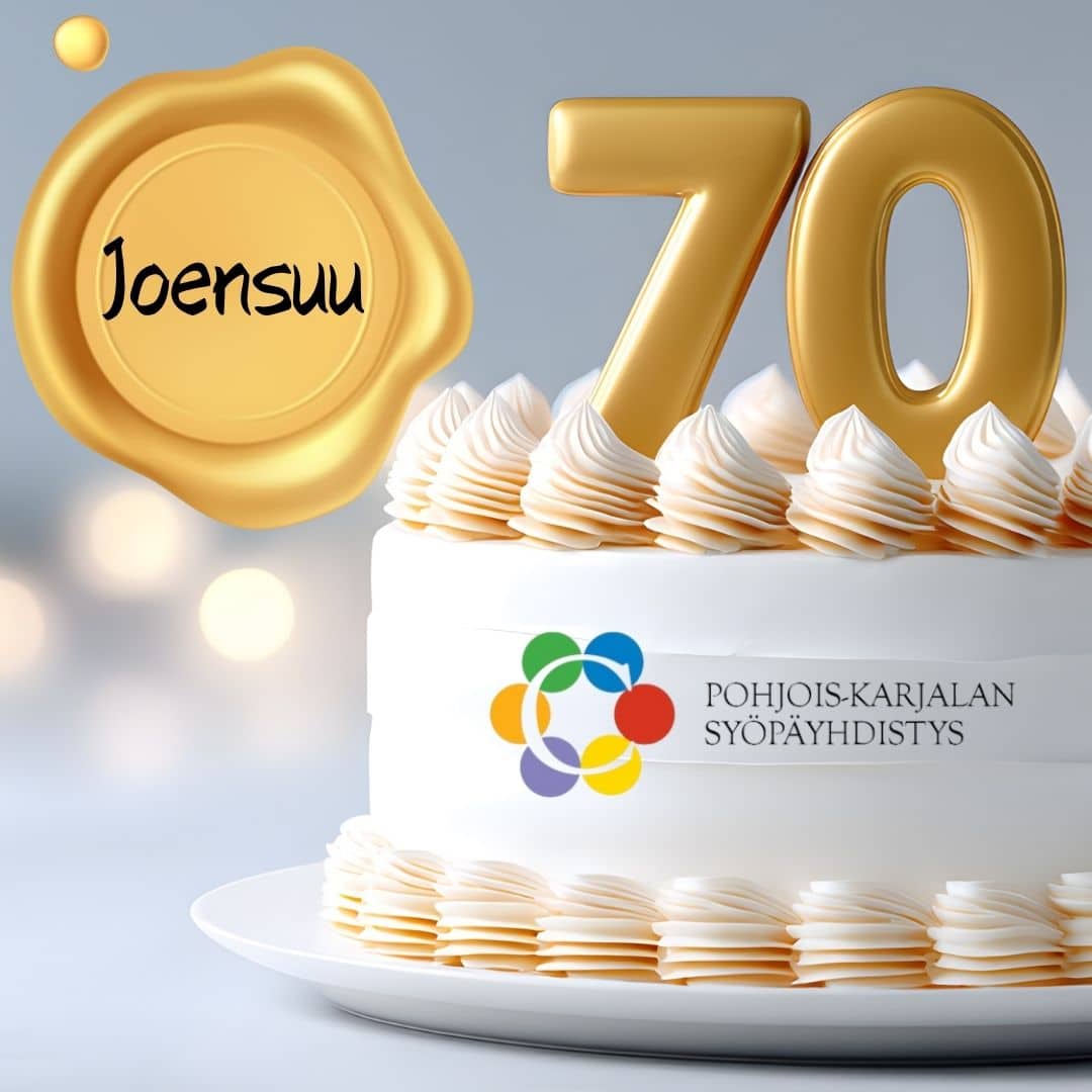 Kuvassa täytekakku ja luku 70